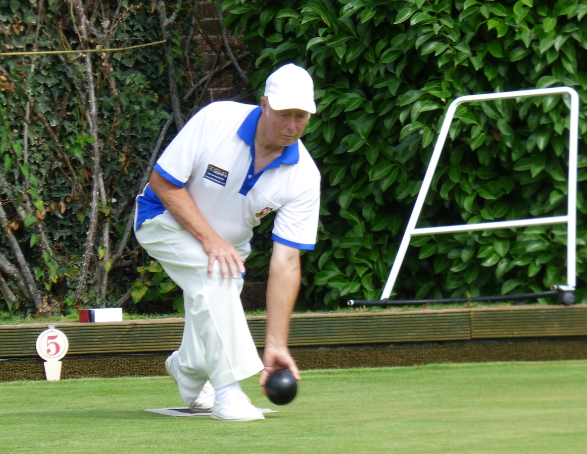 A study in concentration as Mike Woolams bowls.